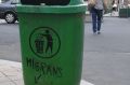 Anti-migrant graffiti on a rubbish bin in downtown Budapest.