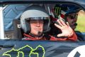 Actor and Top Gear presenter  Matt LeBlanc, left, waves , as he sits with  rally driver Ken Block during filming of BBC ...