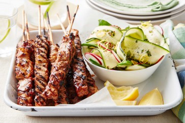 Sweet barbecued chicken kebabs with spring salad