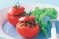 Tomatoes stuffed with wild rice, mince & mint