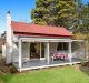 The weatherboard cottage at 7 Clarence Street, Leura.