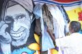 A man checks out a garment left at the Wall of Kindness in Bhilwara, India. 