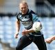 Old bull on the charge: Luke Lewis takes a pass during a Sharks training session at Southern Cross Group Stadium.