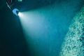 Polish explorer Krzysztof Starnawski explores the limestone abyss before a deeper robotic exploration of the flooded ...