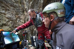 In this photo taken Sept. 27, 2016 in the flooded Hranicka Propast, or Hranice Abyss, in the Czech Republic Polish explorer Krzysztof Starnawski, left, and Bartlomiej Grynda, right, are reading images from a remotely-operated underwater robot, or ROV, that went to the record depth of 404 meters ,1,325 feet, revealing the limestone abyss to be the world's deepest flooded cave, during the 'Hranicka Propast - step beyond 400m' expedition led by Starnawski and partly funded by the National Geographic