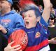 Bulldogs fans show their support during the team's training session at Whitten Oval on Thursday.