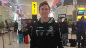 25-year-old Sharks fan Alex Logan is travelling from London to Sydney for the big game.