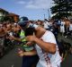 Terrible scenes: A police officer shields a man during the infamous Cronulla riots of 2005.