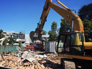 Demolition crews have wasted no time in tearing down shops along Railway Rd in Blackburn to make way for a new 36-unit development called the Boardwalk Blackburn. The three-story apartment building replaces the former NAB branch and Bordello Pizzeria on the corner of Railway Rd and Albert St, and will also include seven retail shops on the ground floor.