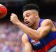 Jason Johannisen on his way to the Norm Smith Medal.