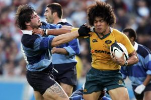 Flashback: Digby Ioane holds off Yannick Forestier during the French Barbarians v Australia A match at Chaban-Delmas ...