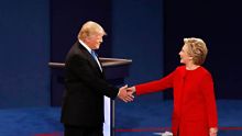 Democratic presidential nominee Hillary Clinton, right, shakes hands with Republican presidential nominee Donald Trump ...