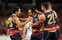 ADELAIDE, AUSTRALIA - SEPTEMBER 10:  Eddie Betts of the Crows is congratulated by teammates after kicking a goal during ...