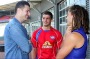 Wil Anderson deep in conversation with a young Luke Dahlhaus and Tom Liberatore. 