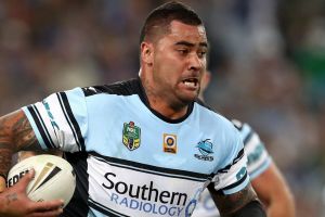 SYDNEY, AUSTRALIA - OCTOBER 02: Andrew Fifita of the Sharks is tackled during the 2016 NRL Grand Final match between the ...