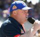 Bulldogs president Peter Gordon speaks during the grand final celebrations at Whitten Oval on Sunday.