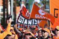 Giants fans arrive before the AFL first preliminary final between Greater Western Sydney and the Western Bulldogs at ...