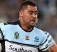 SYDNEY, AUSTRALIA - OCTOBER 02: Andrew Fifita of the Sharks is tackled during the 2016 NRL Grand Final match between the ...