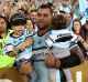 Proud: Andrew Fifita celebrates after the final whistle. 