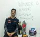 Australian Formula One driver Daniel Ricciardo celebrates his win in the Malaysian Grand Prix.