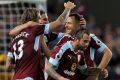 Burnley's Jeff Hendrick, left, celebrates scoring his side's first goal against Watford.