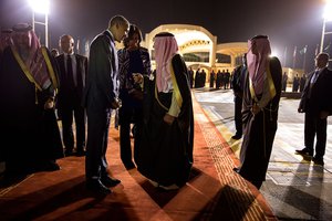 File - President Barack Obama and First Lady Michelle Obama bid farewell to Saudi officials at King Khalid International Airport in Riyadh, Saudi Arabia, Jan. 27, 2015.