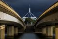 A view of Parliament House from Commonwealth Avenue Bridge, where police and emergency services were called to a ...