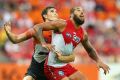 The Swans and Giants go head to head in a historic AFL final and Lance Franklin's clash with Phil Davis will be pivotal.