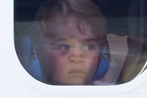 VICTORIA, BC - OCTOBER 01:  Prince George of Cambridge looks out of the window of a sea plane as he departs Victoria on ...