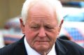 Tom Noble walks out of the Ipswich District Court after his sentencing hearing for 15 counts of serious animal cruelty ...