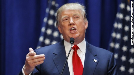 Real estate mogul Donald Trump announces his bid for the presidency in the 2016 presidential race during an event at the Trump Tower on the Fifth Avenue in New York City on June 16, 2015. Trump, one of America&#39;s most flamboyant and outspoken billionaires, threw his hat into the race Tuesday for the White House, promising to make America great again. The 69-year-old long-shot candidate ridiculed the country&#39;s current crop of politicians and vowed to take on the growing might of China in a speech launching his run for the presidency in 2016. &quot;I am officially running for president of the United States and we are going to make our country great again,&quot; he said from a podium bedecked in US flags at Trump Tower on New York&#39;s Fifth Avenue. The tycoon strode onto the stage after sailing down an escalator to the strains of &quot;Rockin&#39; In The Free World&quot; by Canadian singer Neil Young after being introduced by daughter Ivanka. His announcement follows years of speculation that the man known to millions as the bouffant-haired host of American reality TV game show &quot;The Apprentice&quot; would one day enter politics. Trump identifies himself as a Republican, and has supported Republican candidates in the past. But in his announcement speech he did not explicitly say if he was running for the party&#39;s nomination or as an independent.AFP PHOTO/ KENA BETANCUR        (Photo credit should read KENA BETANCUR/AFP/Getty Images)