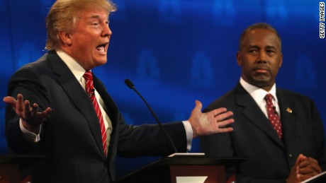 BOULDER, CO - OCTOBER 28:  Presidential candidates Donald Trump (L) speaks while Ben Carson looks on during the CNBC Republican Presidential Debate at University of Colorados Coors Events Center October 28, 2015 in Boulder, Colorado.  Fourteen Republican presidential candidates are participating in the third set of Republican presidential debates.  (Photo by Justin Sullivan/Getty Images)