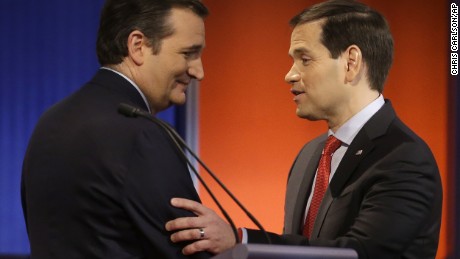 Ted Cruz and Marco Rubio talk after a Republican presidential primary debate, Thursday, Jan. 28, 2016, in Des Moines, Iowa. (AP Photo/Chris Carlson)