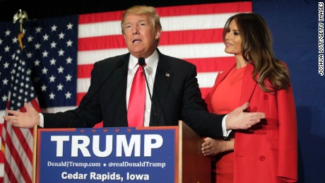 CEDAR RAPIDS, IA - FEBRUARY 1 : Republican presidential candidate Donald Trump speaks with his wife Melania Trump by his side during a campaign event at the U.S. Cellular Convention Center February1, 2016 in Cedar Rapids, Iowa. Trump who is seeking the nomination for the Republican Party attends his final campaign rally ahead of tonight&#39;s Iowa Caucus. (Photo by Joshua Lott/Getty Images)