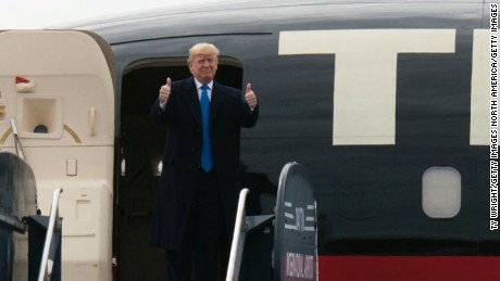 VANDALIA, OH - MARCH 12: Republican Presidential candidate  gives a thumbs up to the crowd walking off his plane at a campaign rally on March 12, 2016 in Vandailia, Ohio. Today was the first rally  after violence broke out in a Trump Rally in Chicago yesterday which canceled the rally. (Photo by Ty Wright/Getty Images)