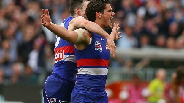 Tom Boyd celebrates the sealer.