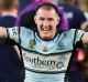 Sheer joy: Paul Gallen celebrates with son Cody.