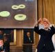 Professor Thors Hans Hansson gives a demonstration after revealing the winners of the Nobel prize in physics in Stockholm.