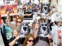 Protestors march on the UK Prime Minister's Downing Street residence to demand a complete ban, in the UK and worldwide, on the trade in antique ivory. Photo: Paul Nicholls Photography.