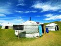 These yurts on Mongolia's 'sea of grass' are powered through a miniature solar microgrid that is both compact and lightweight for easy carriage on to the next site. Photo: Shutterstock.