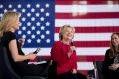 Democratic presidential candidate Hillary Clinton, centre, accompanied by her daughter Chelsea Clinton, right, and ...