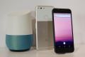 The new Google Pixel phone is displayed next to a Google Home smart speaker.