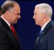 Republican vice-presidential nominee Indiana Governor Mike Pence, right, shakes hands with Democratic vice-presidential ...