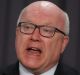 Attorney-General George Brandis consulted former Solicitor-General David Bennett after rejecting advice from Justin Gleeson.