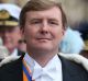 Dutch King Willem-Alexander and Queen Maxima  leave after their inauguration ceremony in Amsterdam in 2013.