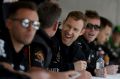 David Reynolds driver of the #9 Erebus Motorsport Penrite Racing Holden laughs during the drivers autograph session ...