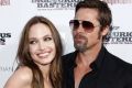 Cast member Brad Pitt, right, and Angelina Jolie arrive at the premiere of Inglourious Basterds in 2009.