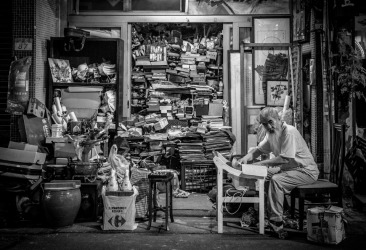 Within the night markets of Taipei, Taiwan, was this antique collector. The length of his beard paralleled the number of ...