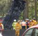 Truck overturned on Mount Ousley Road, AKA Princes Motorway, about 3kms north of Picton Road. .