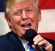 Republican presidential candidate Donald Trump speaks at a town hall-style forum, Thursday, Oct. 6, 2016, in Sandown, ...